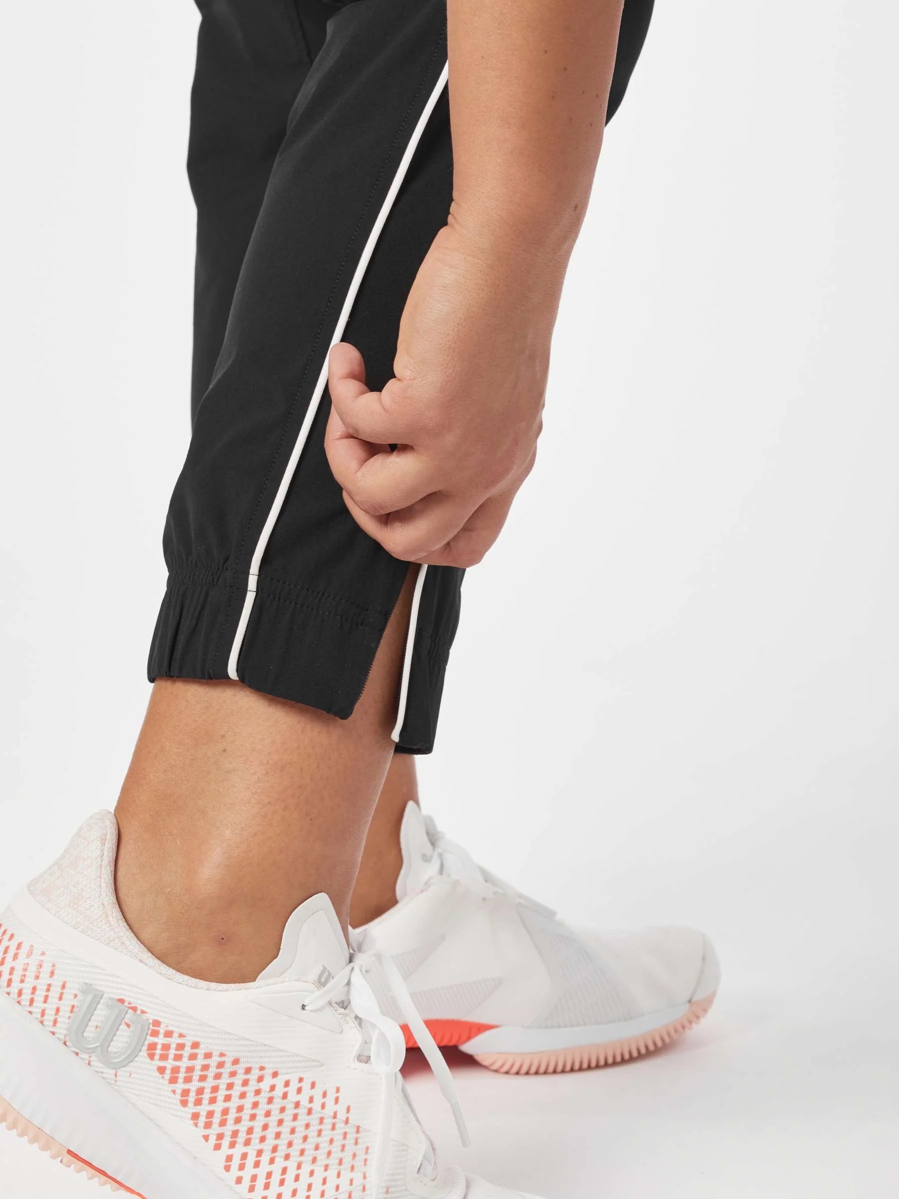 Calcas Mulher WilsonTeam Action Warm Up Pant Black Calças Mulher WilsonTeam Action Warm-Up